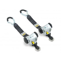 Mechanical retractors for wheelchair tie-down