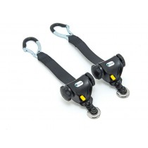 Mechanical retractors for wheelchair tie-down