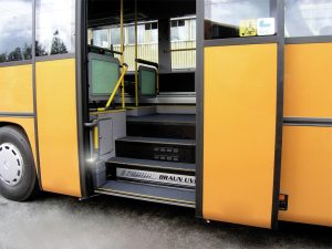 Cassette wheelchair lift for coaches and buses